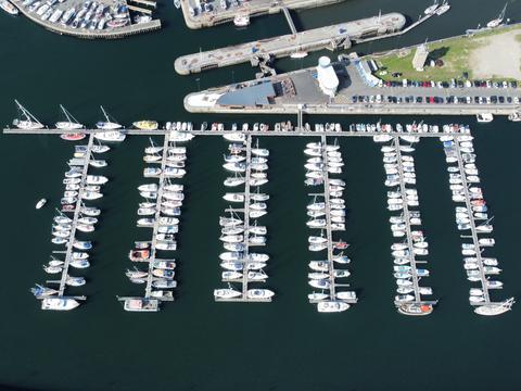 Drone view of yachts moored in a marina